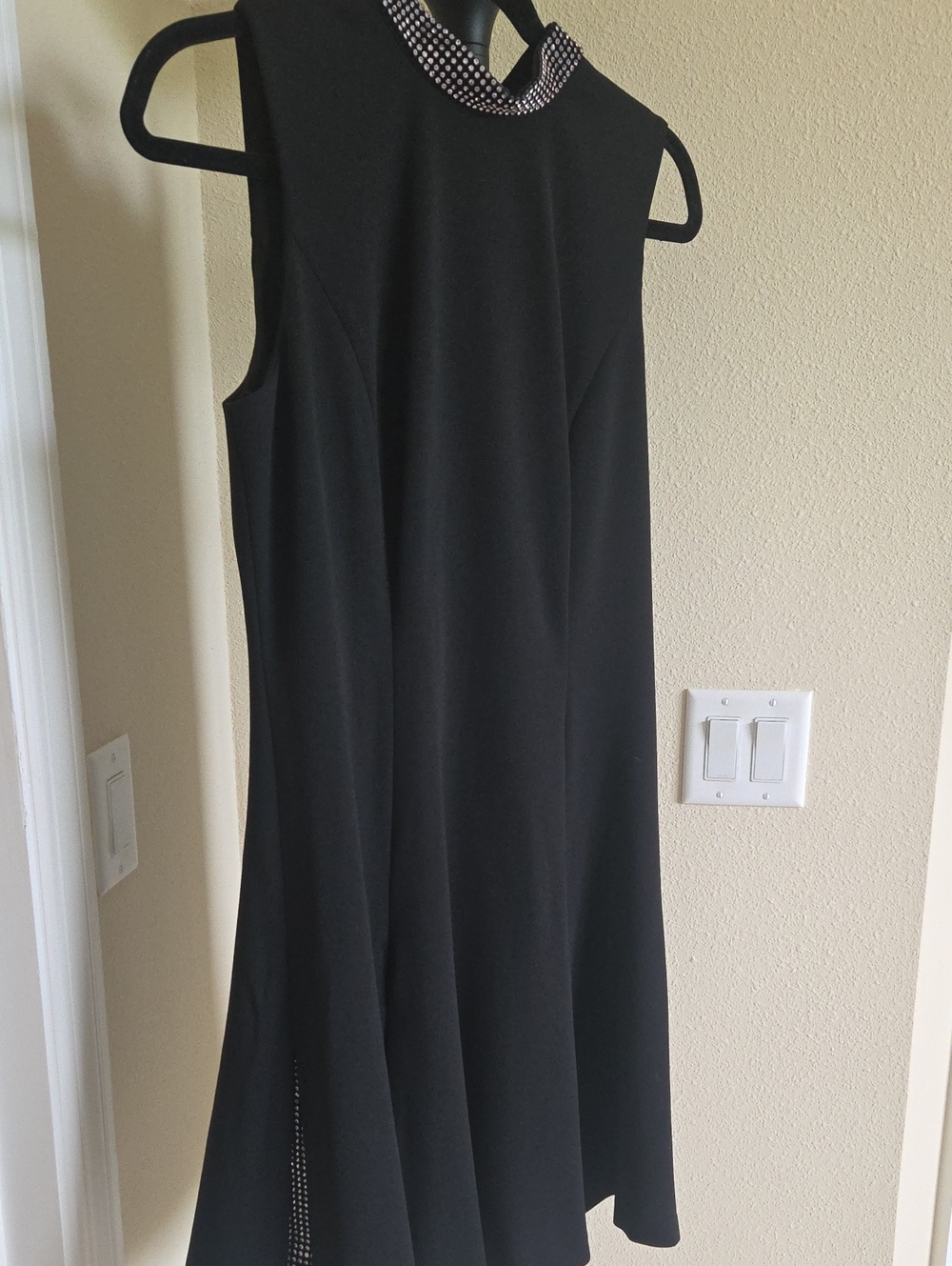 KARL LAGERFELD Black Sleeveless High-Neck Dress with Embellished Collar.